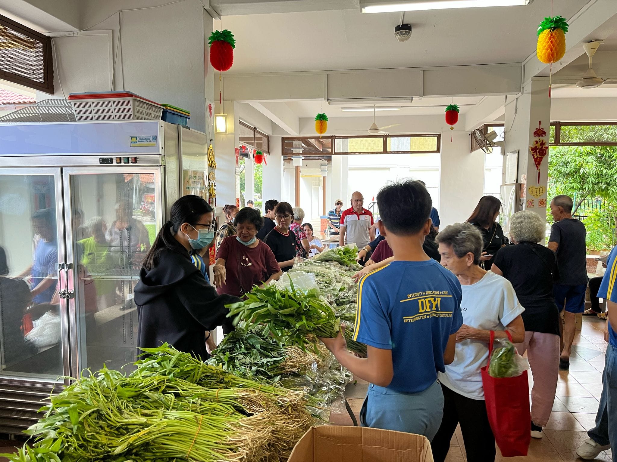 Distribution of vegetables at Cheng San RC Senior Citizens Corner